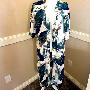 Long sheer duster. Great for beach or a light coverup.